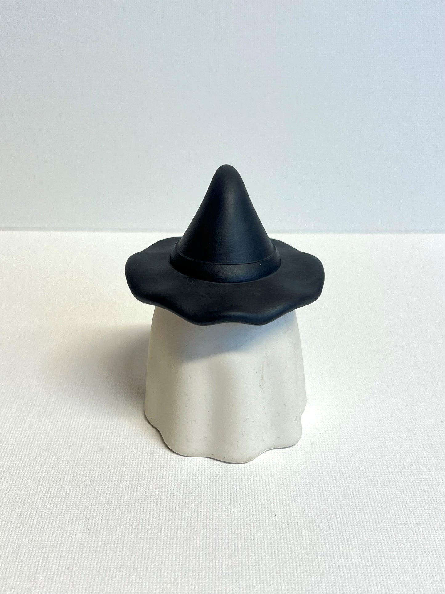 Spøkelse fyrstikk holder